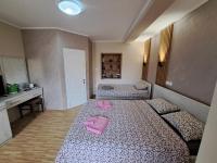Chambre Triple avec Balcon