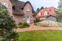 Reetdachhaus Dünengras SPO Reetdachhaus Dünengras SPO - Chambres d’hôtes Sankt Peter-Ording