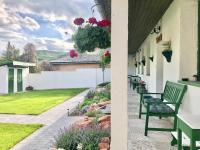 Ladislaus Schnaps-Haus Falusi Vendégház - Ferienwohnung Tscholnok