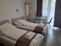 Tweepersoonskamer met 2 Aparte Bedden