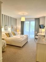 Pokoje Gościnne Villa Plaza - Chambres d’hôtes Ruciane-Nida