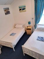 Tweepersoonskamer met 2 Aparte Bedden