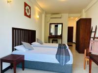 Camera Deluxe Doppia con Letti Singoli