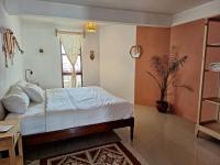 Chambre Triple – Vue sur Montagne