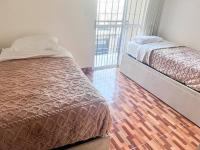 Casa entera con patio, parrilla y cochera - Chambres d’hôtes Lomas de Zamora