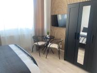 Studio 27mp - Dormitor cu baie proprie - Balcon - Bucatarie complet utilata - B&B Mogoşoaia