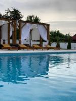 Pensiunea White Department - Chambres d’hôtes Vlădeşti