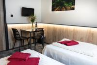 Tweepersoonskamer met 1 of 2 Bedden en Gedeelde Badkamer