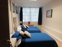 Habitación Doble Deluxe con cama supletoria