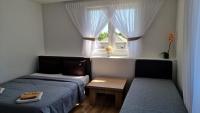 Dreibettzimmer mit eigenem Bad