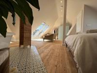 Suite mit Kingsize-Bett und Balkon