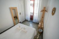 Chambre Quadruple avec Balcon et Salle de Bains Commune