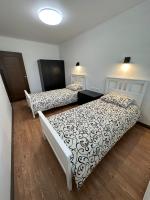 Swan City Family Apartment - Chambres d’hôtes Gulbene