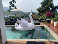 Double R Villa F11 Dago Village - Chambres d’hôtes Bengkok