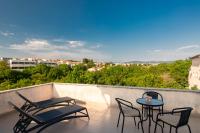 Habitación Doble con balcón (2 adultos + 1 niño)