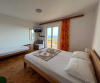 One-Bedroom Apartment with Balcony and Sea View