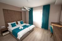Luxe Kamer met 1 of 2 Bedden en Balkon
