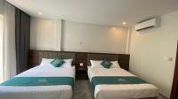 Zimmer mit 2 Queensize-Betten