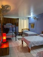 Lit Simple dans Dortoir Mixte