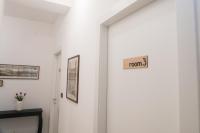 Camera Matrimoniale/Doppia con Letti Singoli con Bagno in Comune