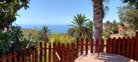 Cabaña Los Palmeros, vista al mar y la montaña - B&B Alojera
