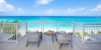 The Beachcomber - Oceanfront Penthouses by Grand Cayman Villas & Condos