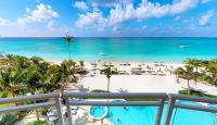 The Beachcomber - Three Bedroom Ground FL Oceanfront Condos by Grand Cayman Villas & Condos