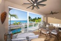 The Beachcomber - Three Bedroom Ground FL Oceanfront Condos by Grand Cayman Villas & Condos