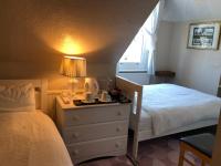 Tweepersoonskamer met 2 Aparte Bedden