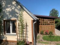 Arbatinės apartamentai - Močiutės namelis - B&B Biržai