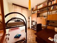 Camera Doppia con Letti Singoli e Bagno in Comune