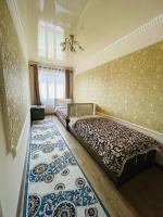 Camera Doppia con Letti Singoli e Bagno in Comune