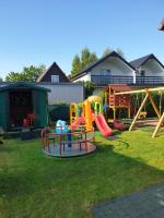 Apartamentowe domki drewniane Colorado - B&B Karwia