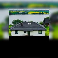 Chojno 31i- dom wypoczynkowy przy jeziorze z jacuzzi - Chambres d’hôtes Chrostkowo