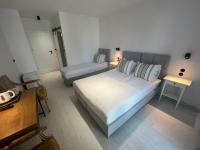 Dreibettzimmer mit Balkon