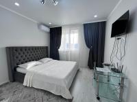 Уютная квартира напротив спорткомплекса Алматы Арена, 51-24 - Ferienwohnung Almaty