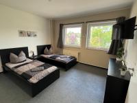 Camera Matrimoniale/Doppia con Letti Singoli con Bagno in Comune