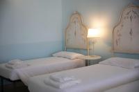 Camera Quadrupla Superior