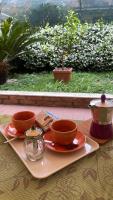 B&B Carrare - Bilocale Carrara Centro con giardino e parcheggio moto - Bed and Breakfast Carrare