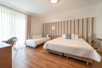 Dreibettzimmer mit Balkon