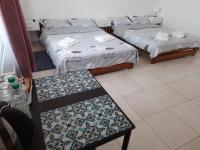 Chambre Quadruple avec Salle de Bains Privative