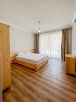 One-Bedroom Apartment with Balcony and Mountain View  