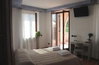 Camera Matrimoniale/Doppia con Letti Singoli con Letto Supplementare