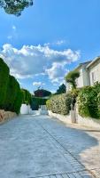 Casa con Jardín y Piscina Comunitaria - Chambres d’hôtes