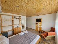 Kamer met Kingsize Bed en Uitzicht op de Tuin