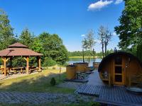 Domki Borowiackie nad brzegiem jeziora - B&B Bysław