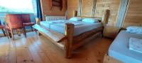 Chambre Triple – Vue sur Montagne