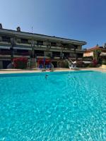 Appartamenti Residence il Porto 13 e 16 - Chambres d’hôtes