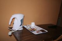 Camera Matrimoniale/Doppia con Letti Singoli con Bagno in Comune