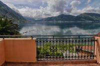 Appartamento su 2 Livelli con Balcone e Vista Mare